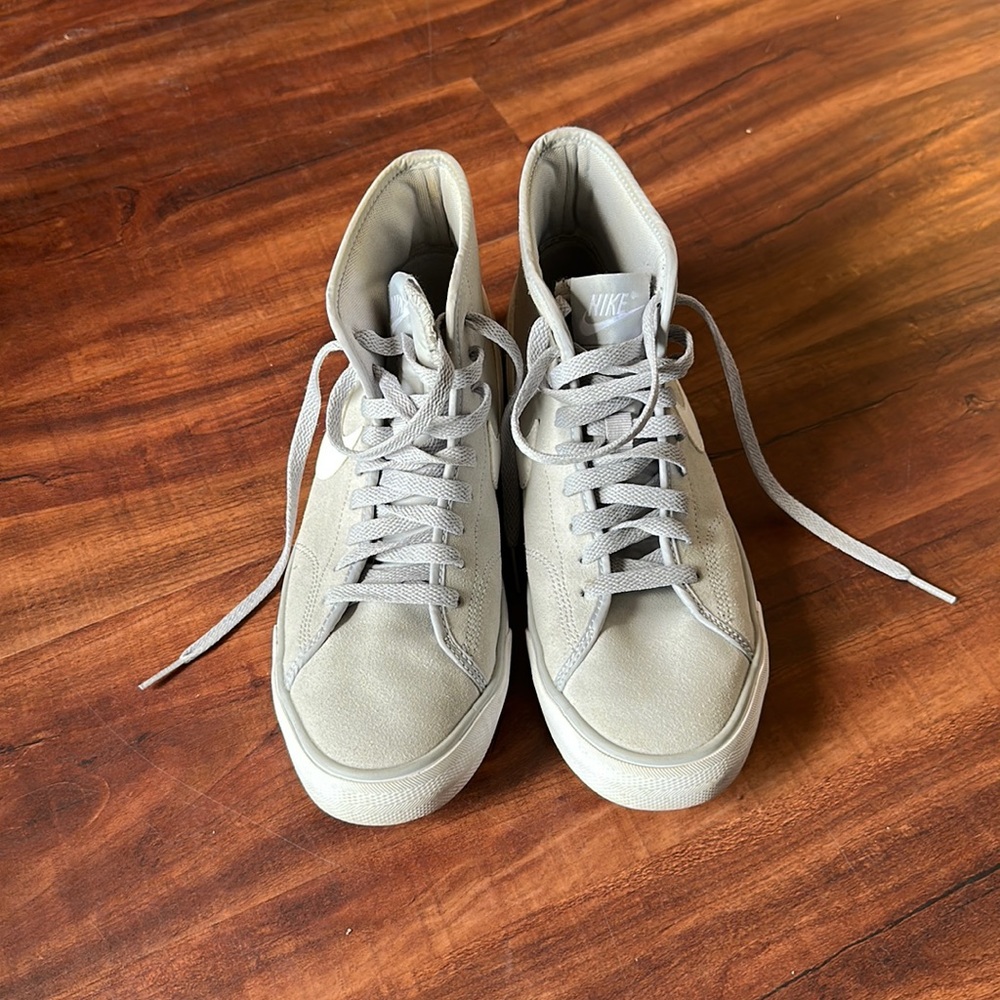Grey Nike high tops in women’s size 8.5